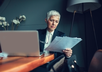 Woman looking at documents